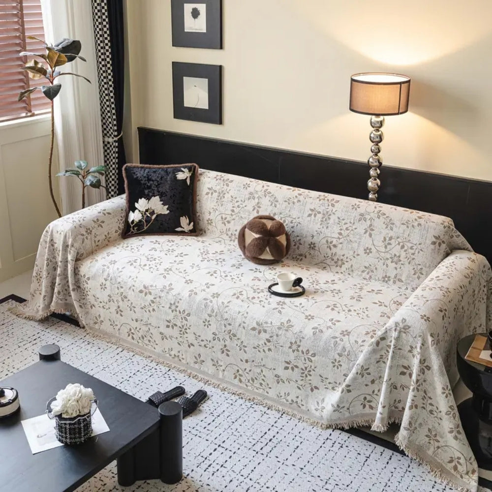 Rustic Blossom Ivory Floral Sofa Cover — product in use