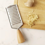Stainless Steel Handheld Grater — product in use