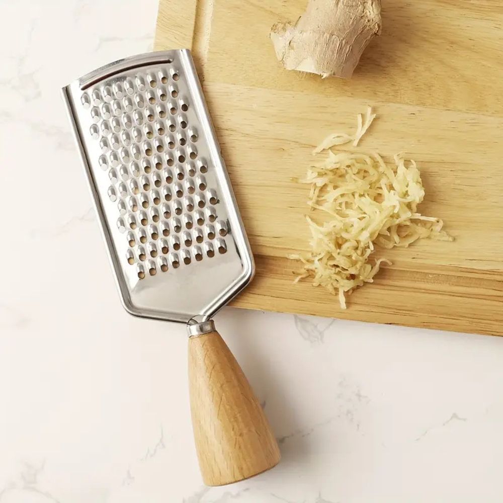 Stainless Steel Handheld Grater — product in use