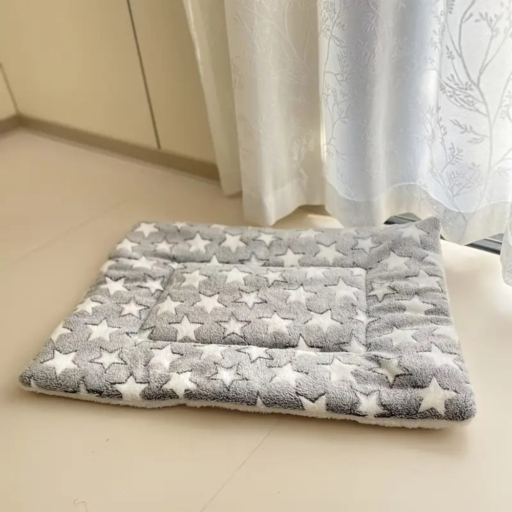 Snuggly Star Ultra-Warm Pet Bed — material texture close-up
