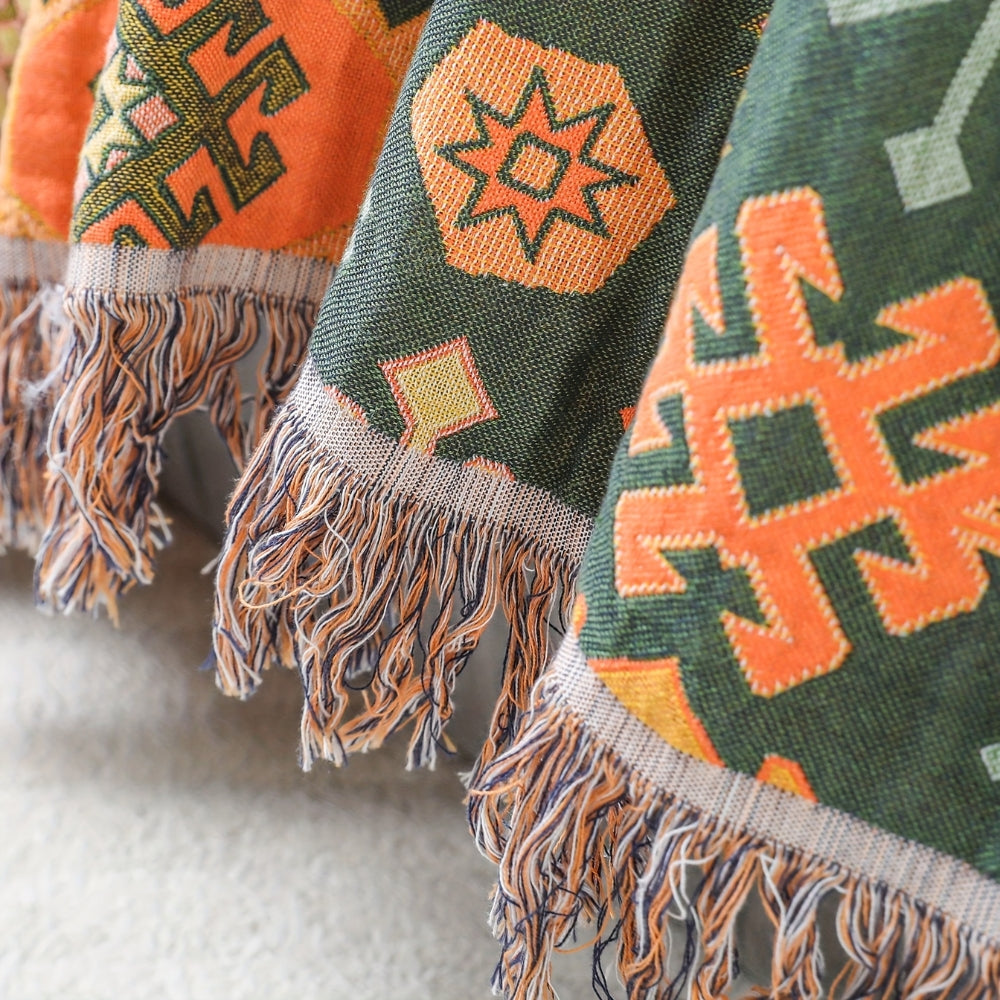 Tribal-Inspired Soft Geometric Fringe Blanket — product in use