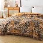 Tribal Patchwork Reversible Tassel Cotton Blanket — product in use