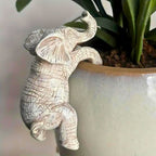 Unique Elephant Climbing Sculpture — product detail view