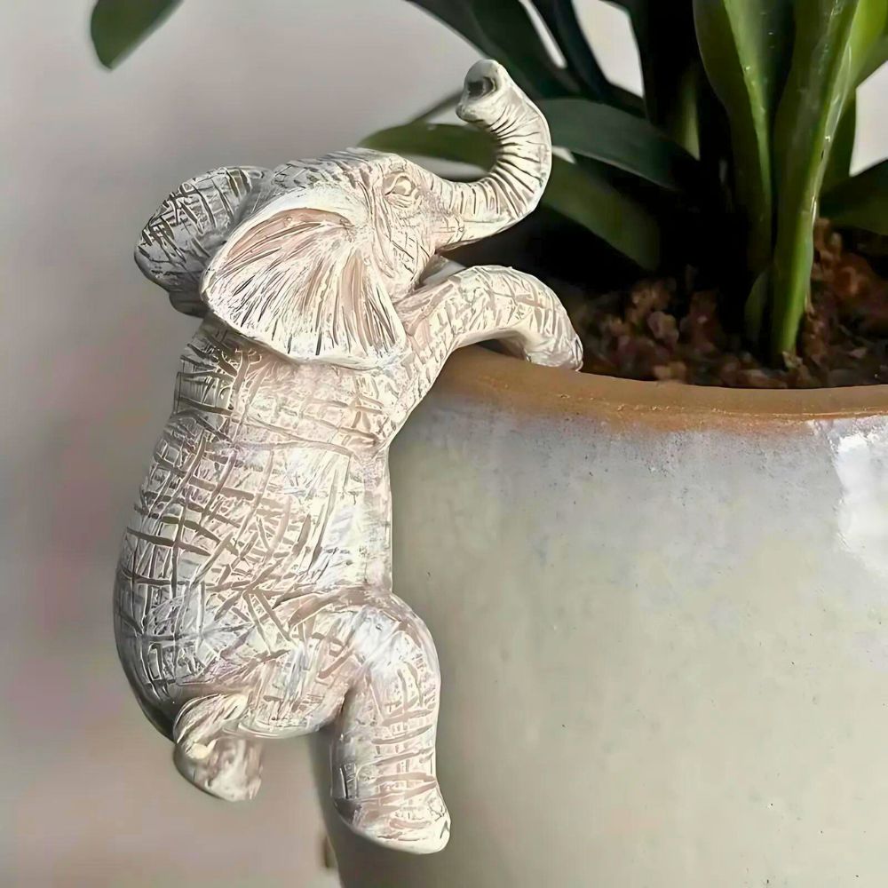 Unique Elephant Climbing Sculpture — product detail view