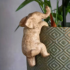 Unique Elephant Climbing Sculpture — product in use