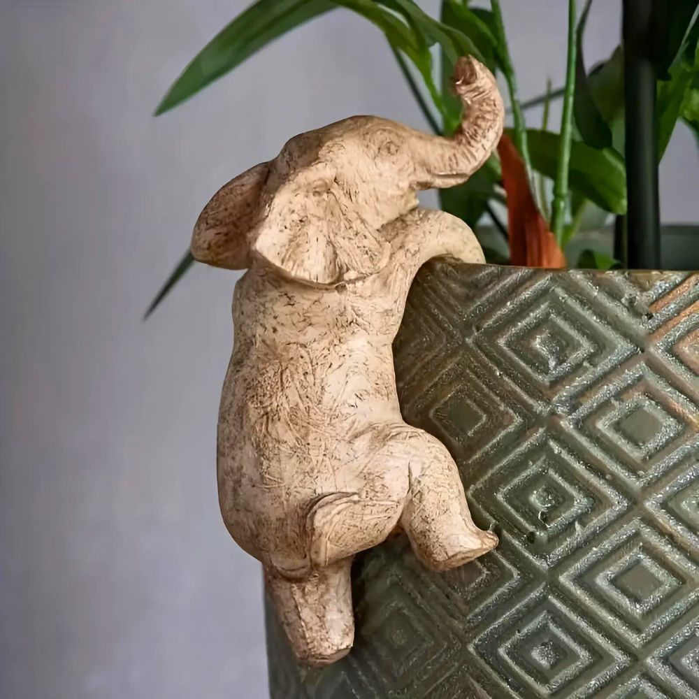 Unique Elephant Climbing Sculpture — product in use