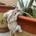 Unique Elephant Climbing Sculpture — main product photo
