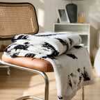 Velora Black White Fuzzy Knit Throw — product in use