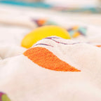 Whimsical Bird Tassel Cotton Blanket — product in use