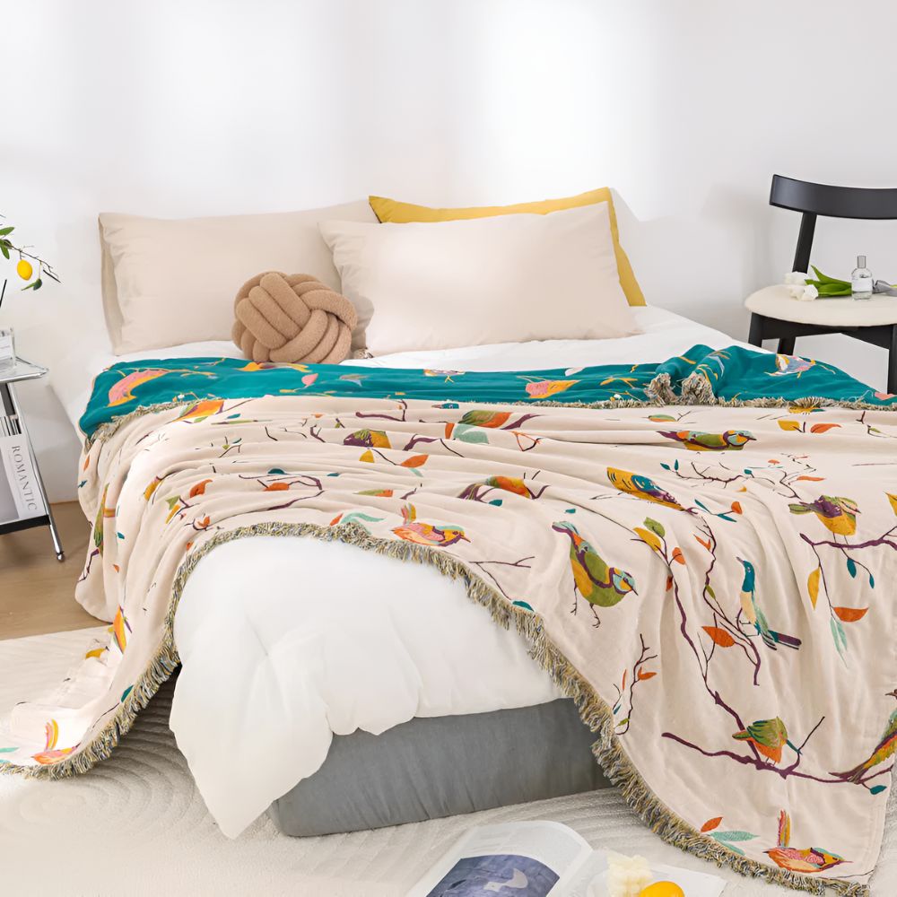 Whimsical Bird Tassel Cotton Blanket — product close-up