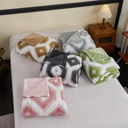 Zyra Double Layer Geometric Throw Blanket — product in use
