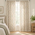 Wildflower Lace Ruffle Curtain drawn closed in a bedroom, cream botanical print filtering soft daylight