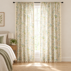 Wildflower Veil Curtain drawn closed in a bedroom, botanical leaf print filtering soft daylight