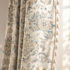 Botanical Bliss Tassel Curtain — close-up of medallion print and beige tassel edge in window light
