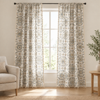 Botanical Bliss Tassel Curtain — cream panels with slate blue and mustard octagonal medallion print and tassel trim on a living room window