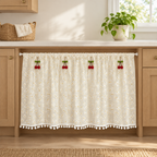 Daisy Breeze Cabinet Curtain covering an open lower kitchen cabinet on a tension rod