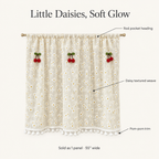 Daisy Breeze Cabinet Curtain features: rod pocket heading, daisy textured weave, pom-pom trim, sold as 1 panel 55 inches wide