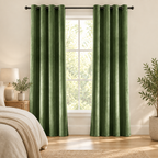 Grass green soft velvet curtains softening daylight in a calm bedroom