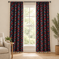 Cherry Bloom Botanical Tassel Curtain — navy jacquard panels with red cherries, green leaves and cream tassel trim on a living room window