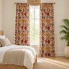 Color wheel bloom tassel curtains framing a bright bedroom window