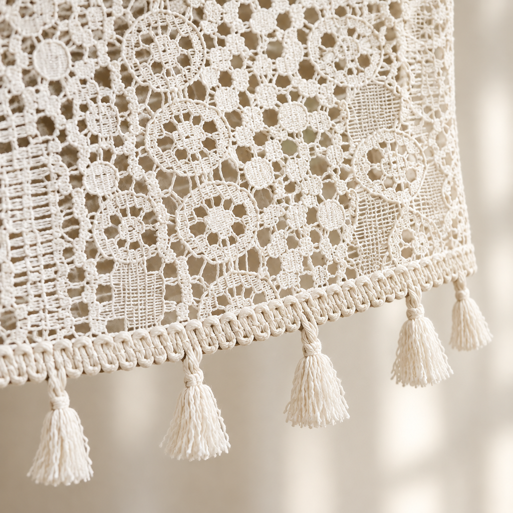 Chic Bohemian Crochet Curtain — close-up of braided edging and cream tassels on the hem