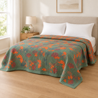 Ginkgo Orange Leaf Floral Pattern Coverlet – spread over a made bed in a bright bedroom with plain white pillows