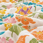 Blossom Bay Breathable Cotton Coverlet – close-up of the botanical print and cotton texture
