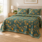 Jacquard Floral Ginkgo Leaves Reversible Coverlet – on a made bed with matching jacquard pillowcases