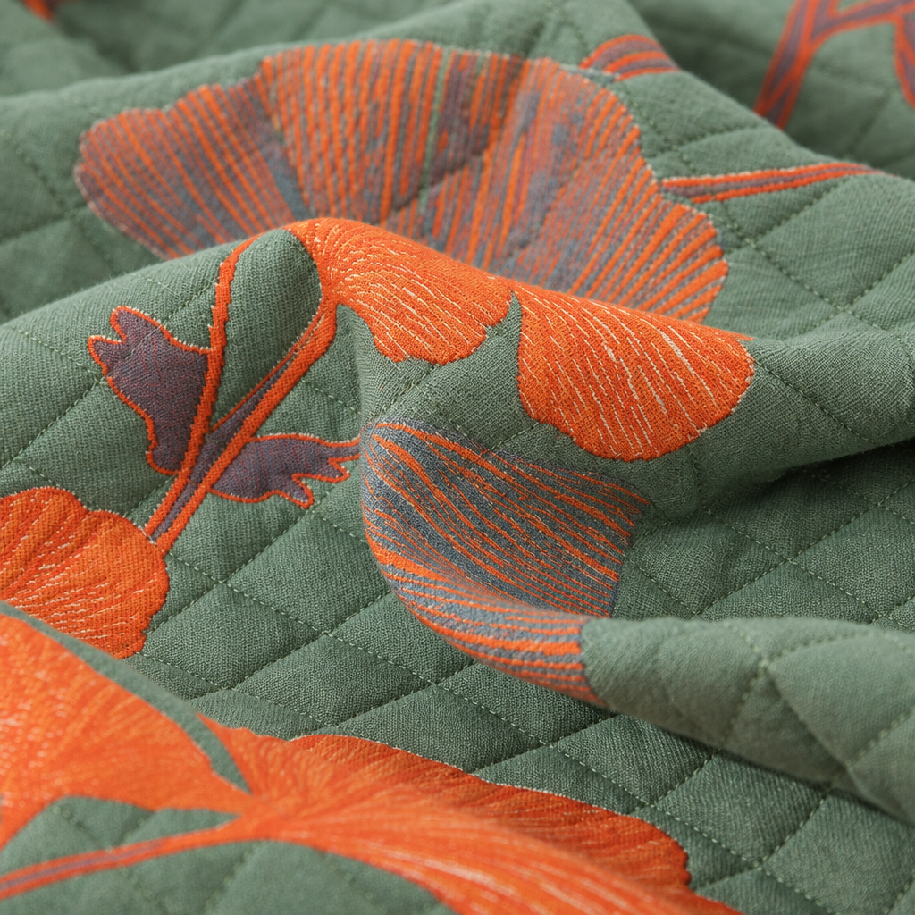 Ginkgo Orange Leaf Floral Pattern Coverlet – close-up of the orange ginkgo leaf print and diamond quilting