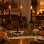 Black Swirl wavy taper candelabra as a Thanksgiving dinner table centrepiece with burgundy candles