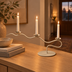 Cream Waves wavy taper candelabra on an oak console table in an entryway at dusk