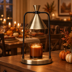 Champagne Noir candle warmer lamp on a dining sideboard at Thanksgiving with pumpkins