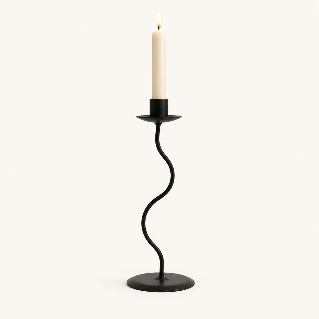 Small 9.4 inch matte black wavy iron taper candle holder with a lit candle