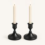 Shimmering Vintage Candle Holder set of 2 in Midnight Noir matte black with lit ivory taper candles