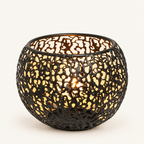 Glow Sphere tealight holder in Black, pierced metal globe with a lit tealight