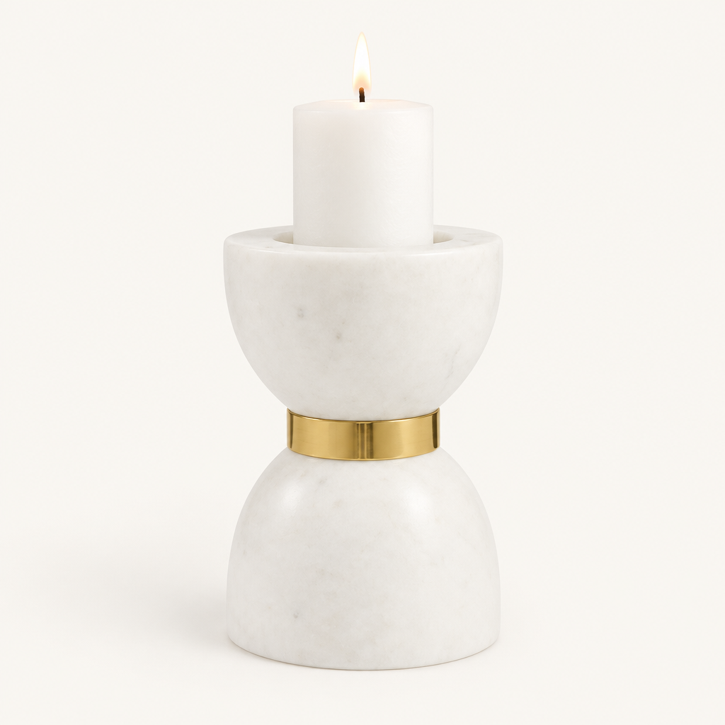 Large Colette marble hourglass candle holder with a lit white pillar candle