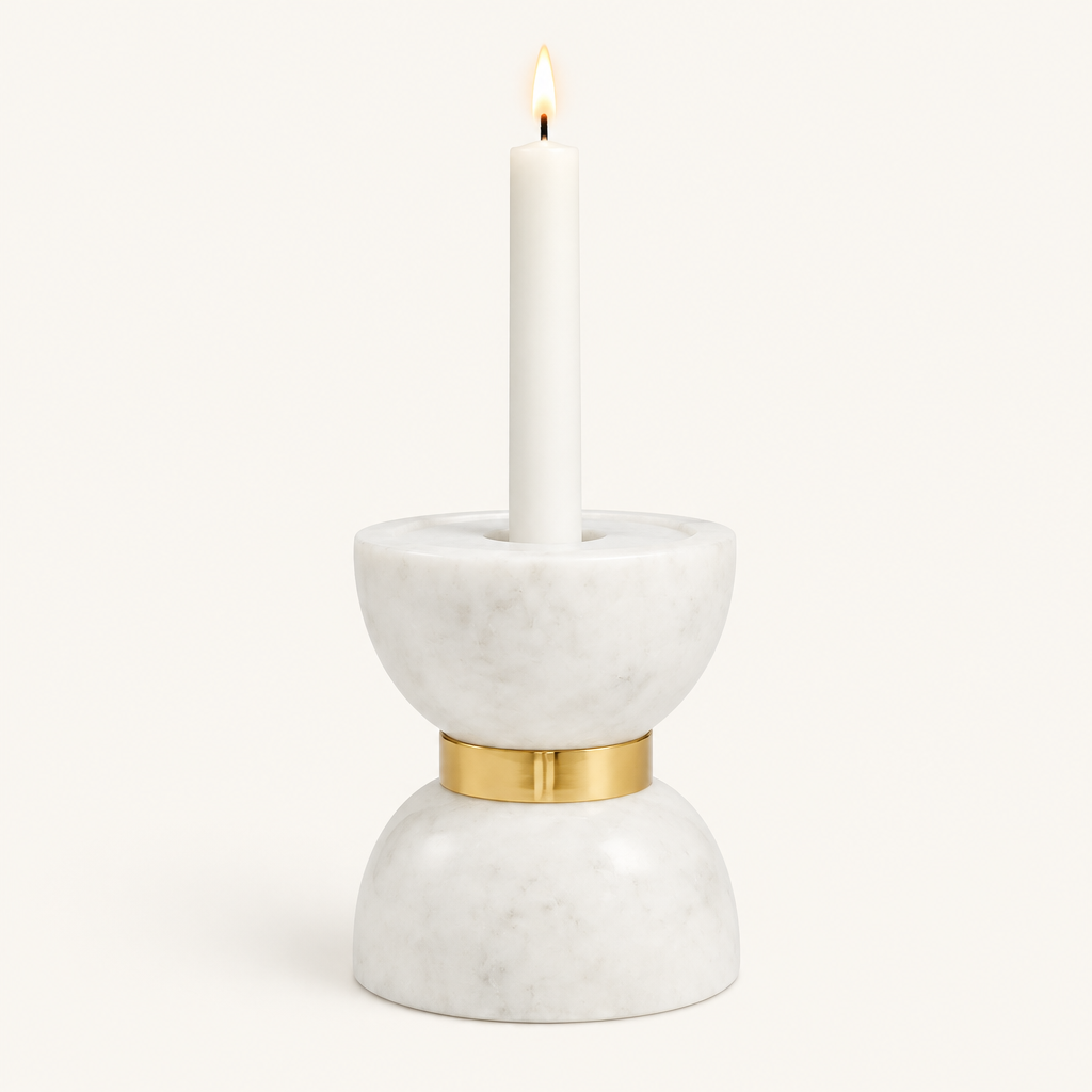 Small Colette marble hourglass candle holder with a lit white taper candle