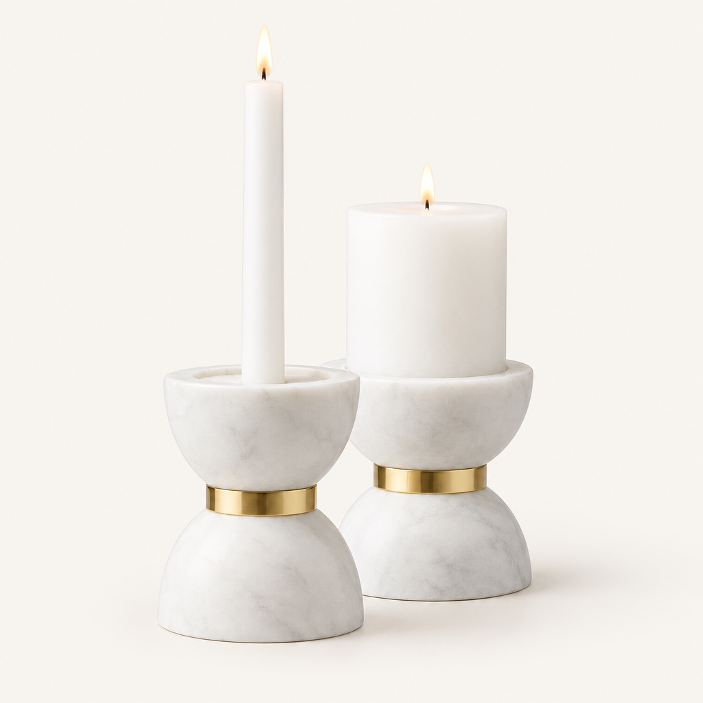 Colette white marble hourglass candle holders with gold band, holding a lit taper and a lit pillar candle