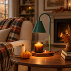 Forest Cone candle warmer lamp on a living room side table by the fire