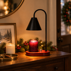 Black Cone candle warmer lamp on an entryway console at Christmas