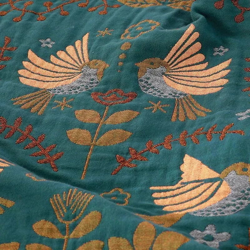 Reversible Scandinavian Bird Blanket | 100% Cotton Blanket — product in use